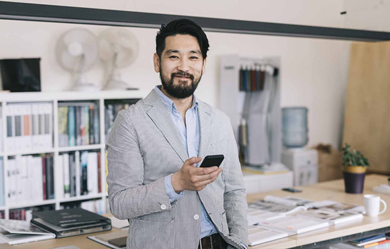 Bike shop business owner with tablet